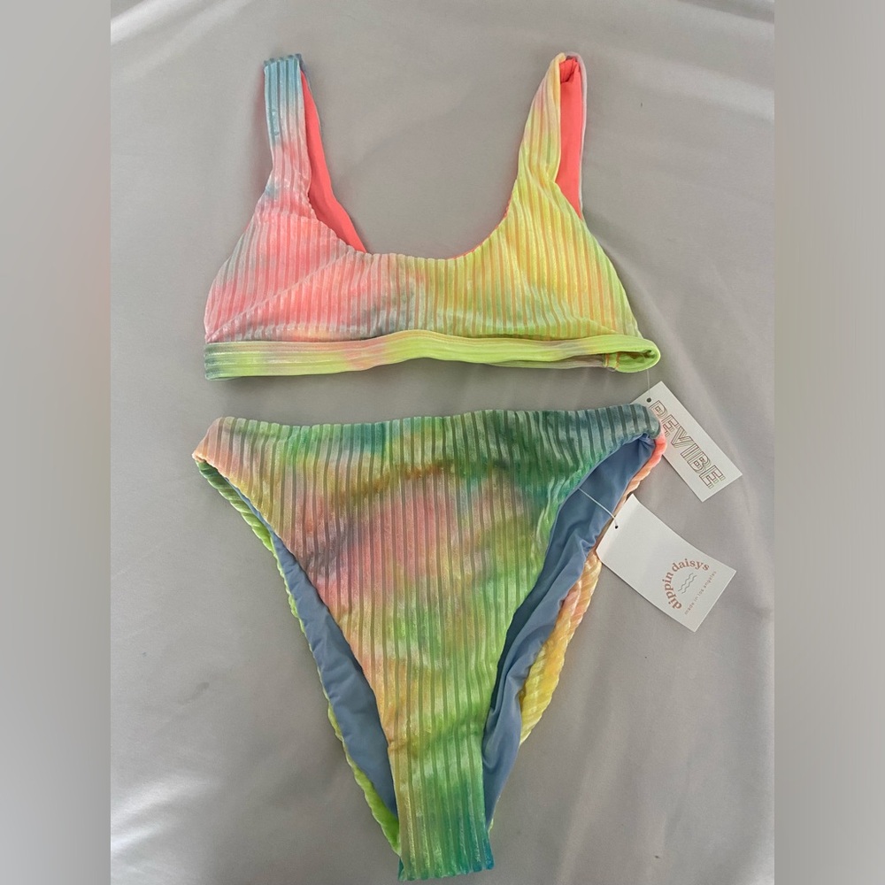 High waisted bottoms and festival top. Multi colored velvet ribbed.